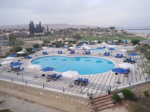Outdoor pool, pool umbrellas, pool loungers