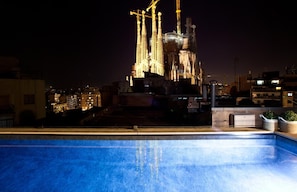Outdoor pool, open 9:00 AM to 10:00 PM, pool umbrellas, pool loungers