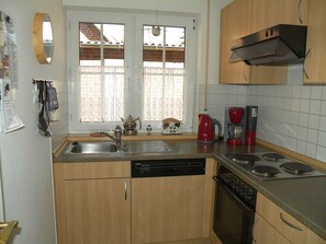 Fridge, oven, dishwasher, coffee/tea maker