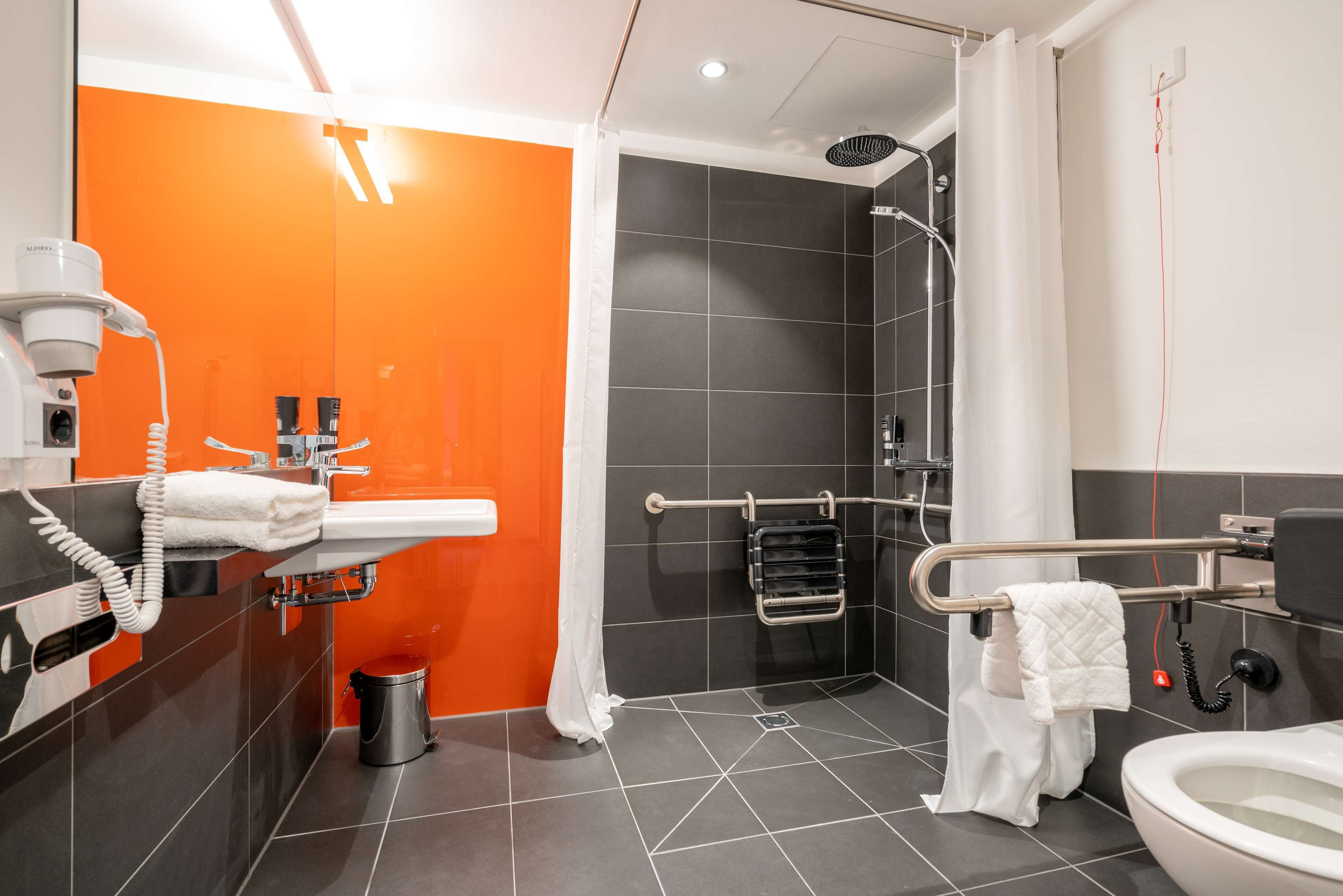 standard room, multiple beds | bathroom | shower, eco-friendly toiletries, hair dryer, towels