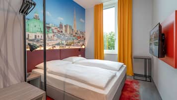 Laptop workspace, blackout curtains, soundproofing, free WiFi