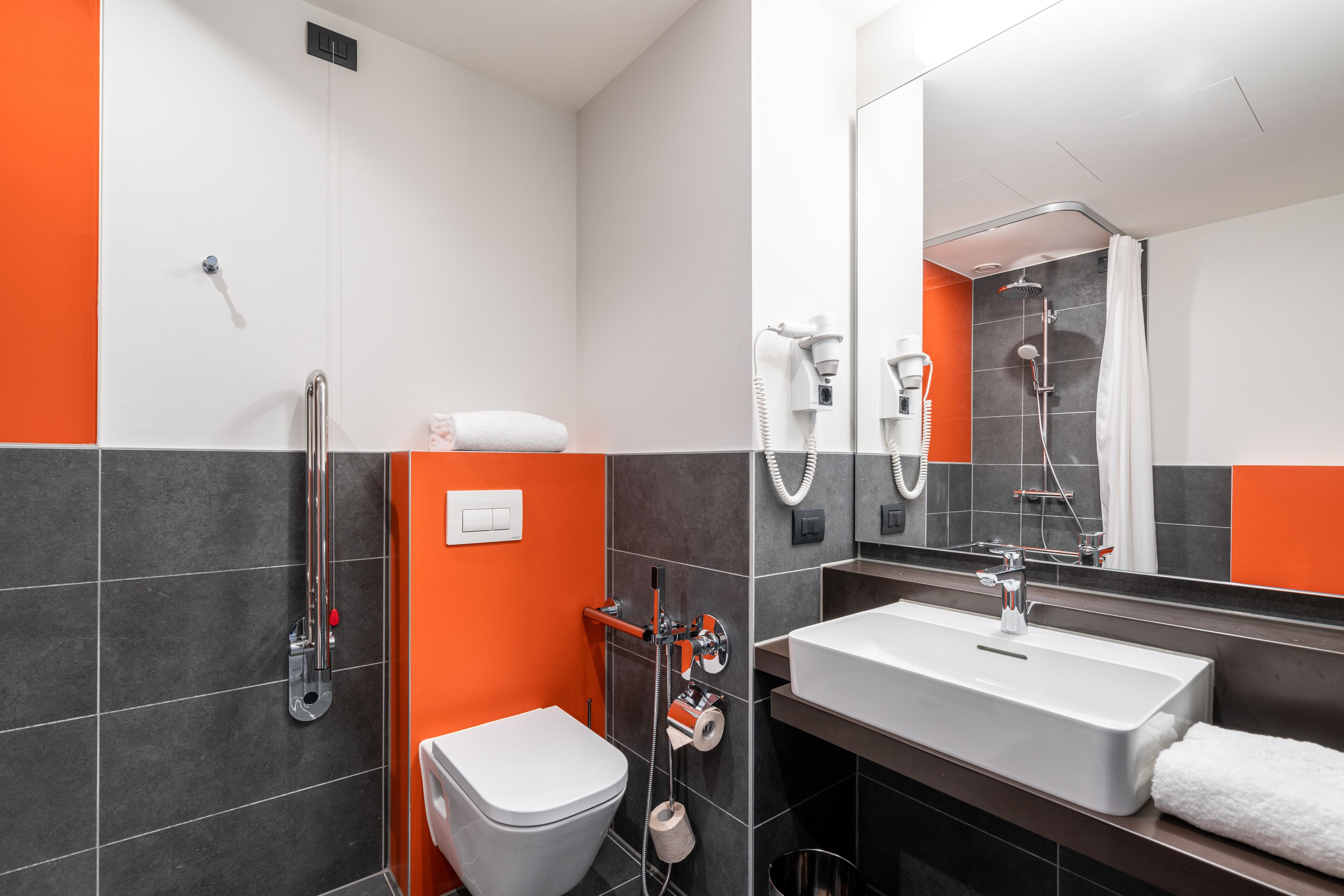 shower, eco-friendly toiletries, hair dryer, towels