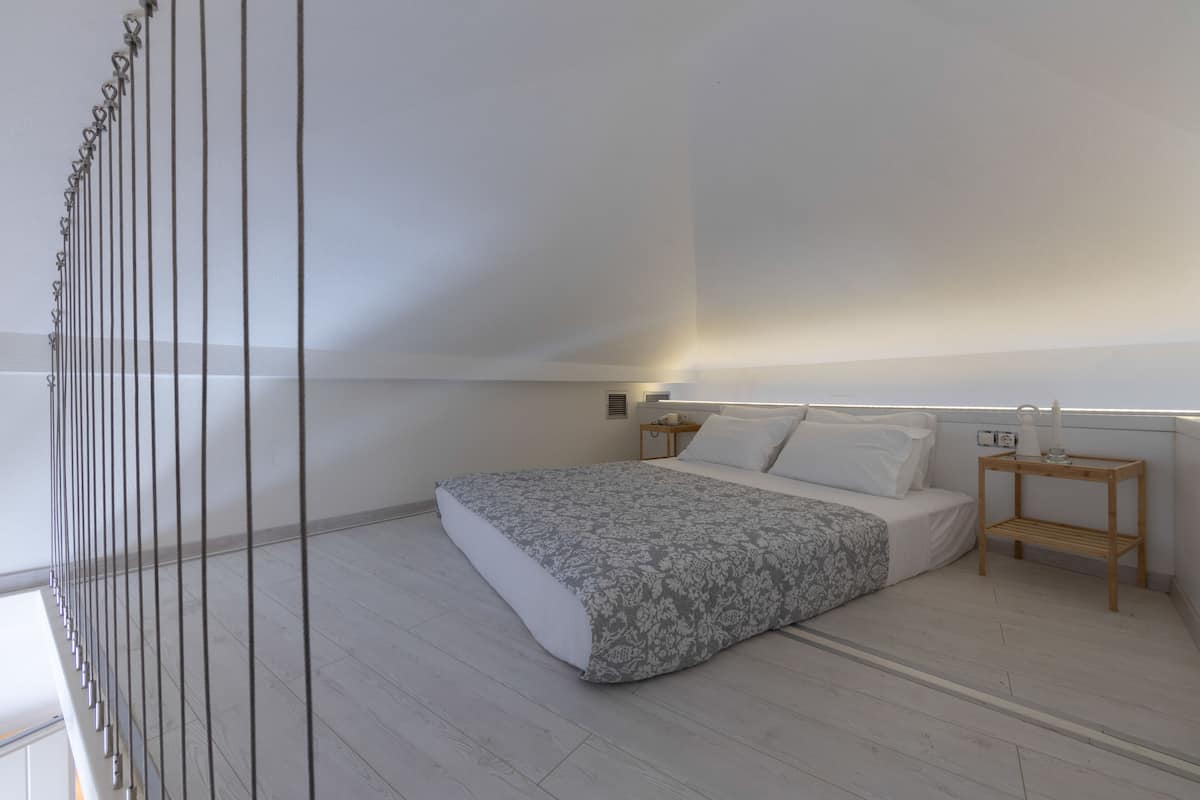 Family Studio Suite | Minibar, in-room safe, individually decorated, blackout drapes