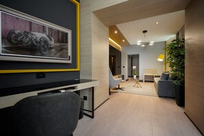 Executive Suite | Living area | 88-cm flat-screen TV with cable channels, TV