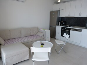 Exclusive Apartment, 2 Bedrooms | Living area | Flat-screen TV - Apartment NoStress (Omis)