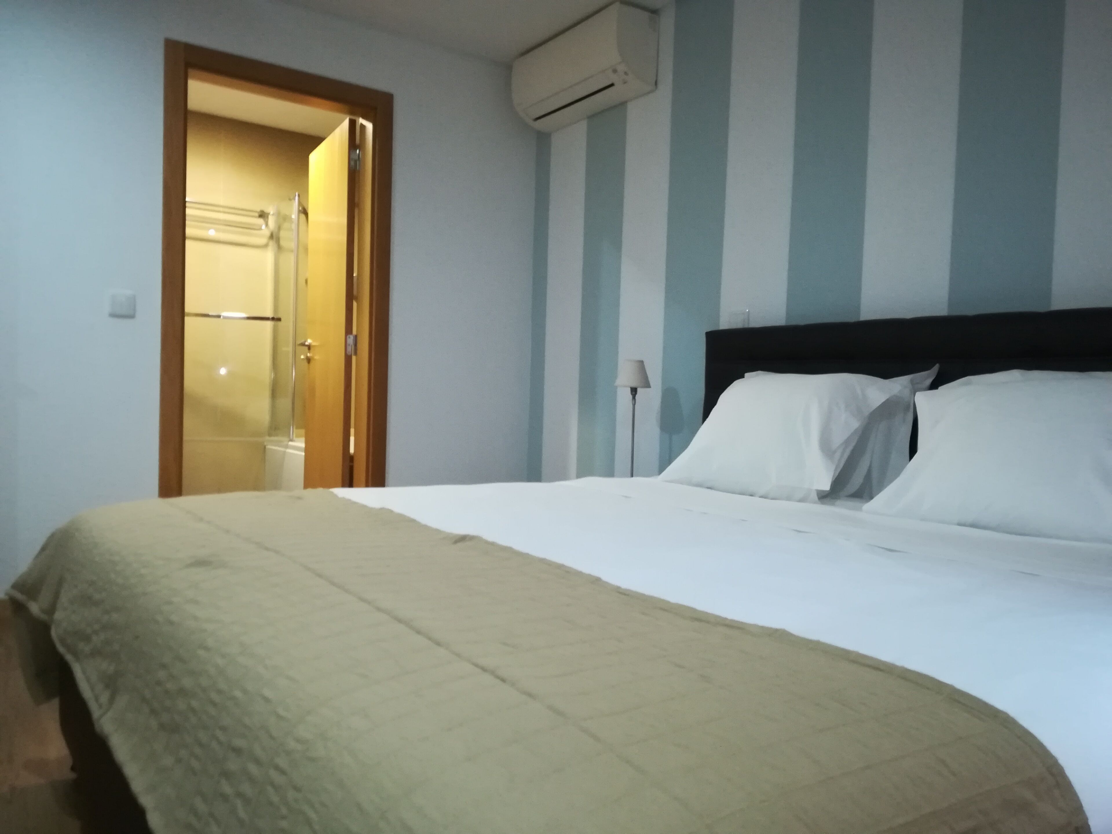 Premium bedding, blackout curtains, soundproofing, iron/ironing board