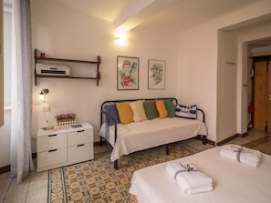 Economy Apartment, 2 Bedrooms, Partial Sea View | Iron/ironing board, cots/infant beds, free WiFi, bed sheets