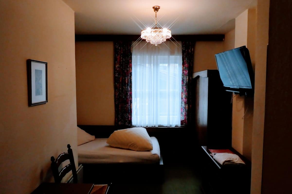 Habitación individual | Escritorio, wifi gratis, ropa de cama