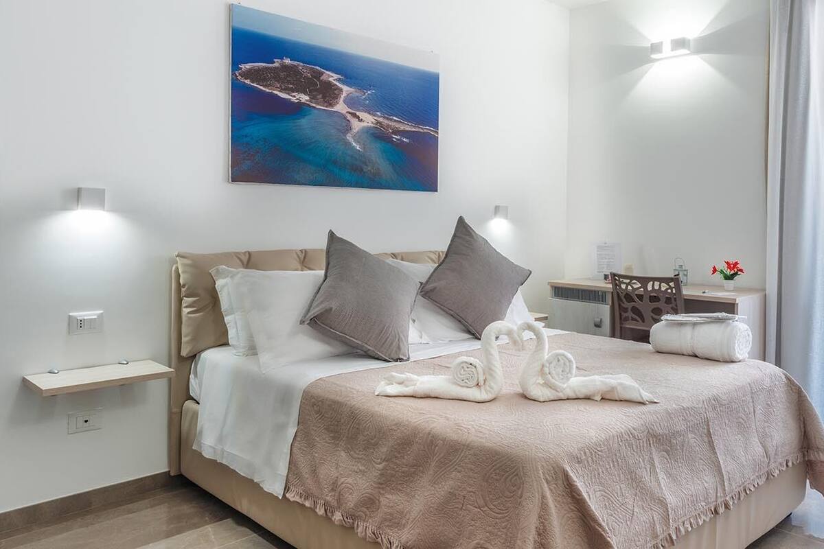 Quadruple Room (Capo Passero) | Minibar, desk, soundproofing, WiFi (free)