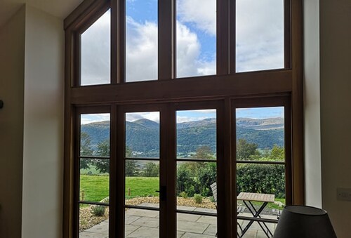 A recently converted barn that sits high above the beautiful Conwy Valley.