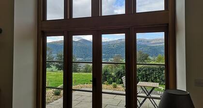 A recently converted barn that sits high above the beautiful Conwy Valley.