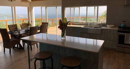 Spacious house with an amazing view of the ocean on a private deck.