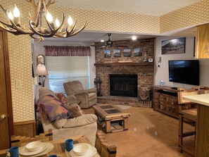 Flat-screen TV, fireplace, DVD player