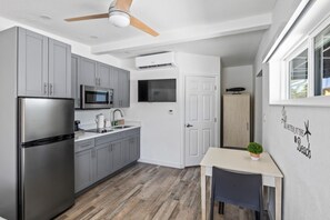 Villas King Suite 1st Floor | Private kitchen | Coffee/tea maker, cleaning supplies, paper towels