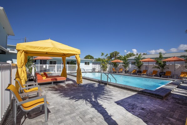 Outdoor pool, open 9:00 AM to 8:00 PM, free cabanas, pool umbrellas - The Villas at St Pete Beach (St. Pete Beach)