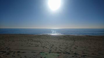On the beach, beach towels