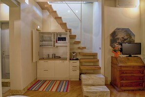 Luxury Duplex, Ensuite, City View (Roof Top Altana) | Shared kitchen - Rinidia Siena Centro (Siena)