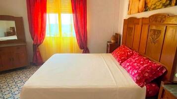 3 bedrooms, desk, iron/ironing board, travel cot