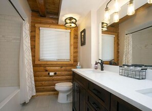 Combined shower/bathtub, hair dryer, towels, soap
