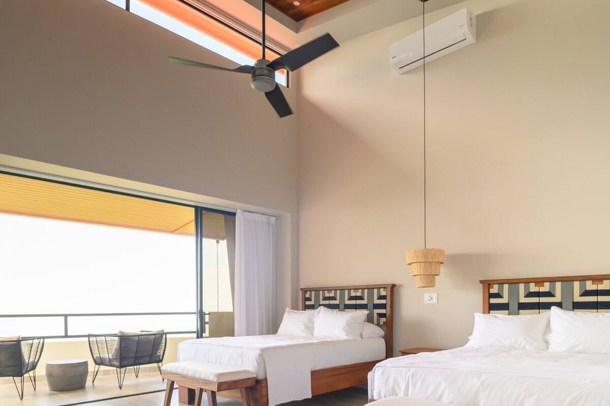 Deluxe Double Room Single Use | Memory-foam beds, in-room safe, desk, blackout curtains