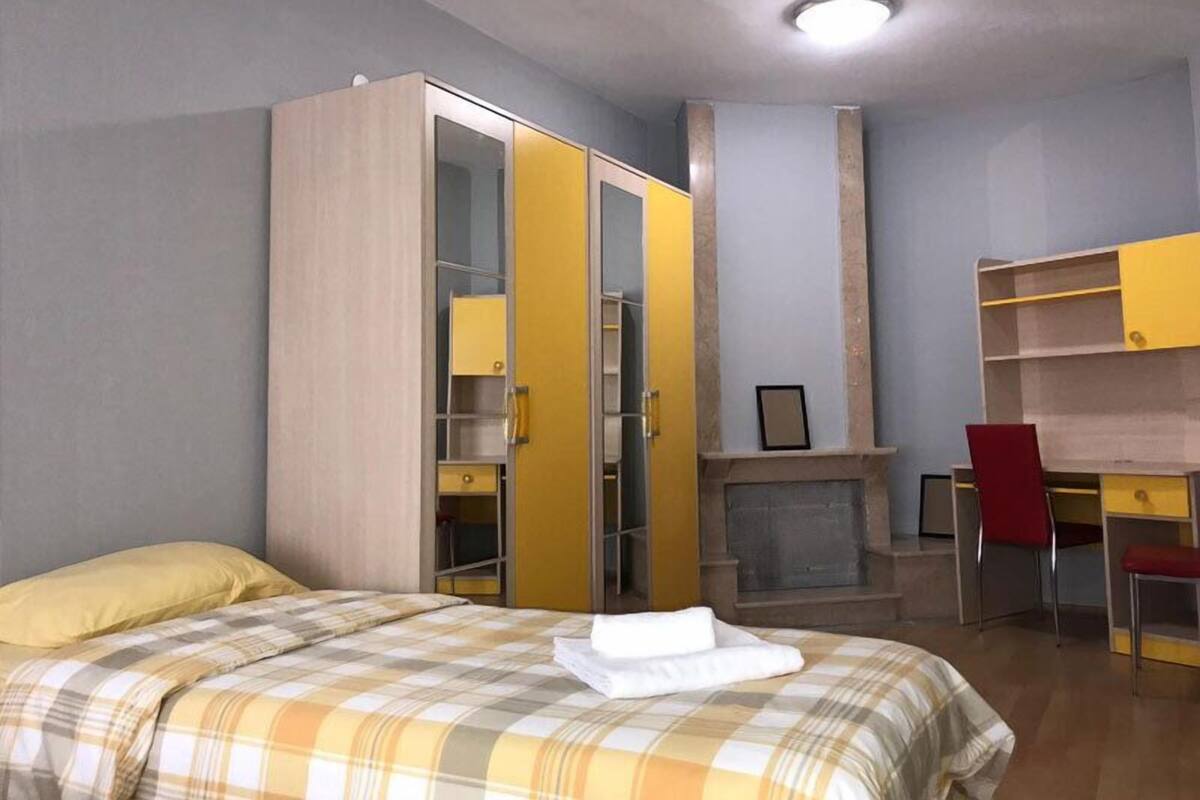 Desk, laptop workspace, free WiFi, bed sheets