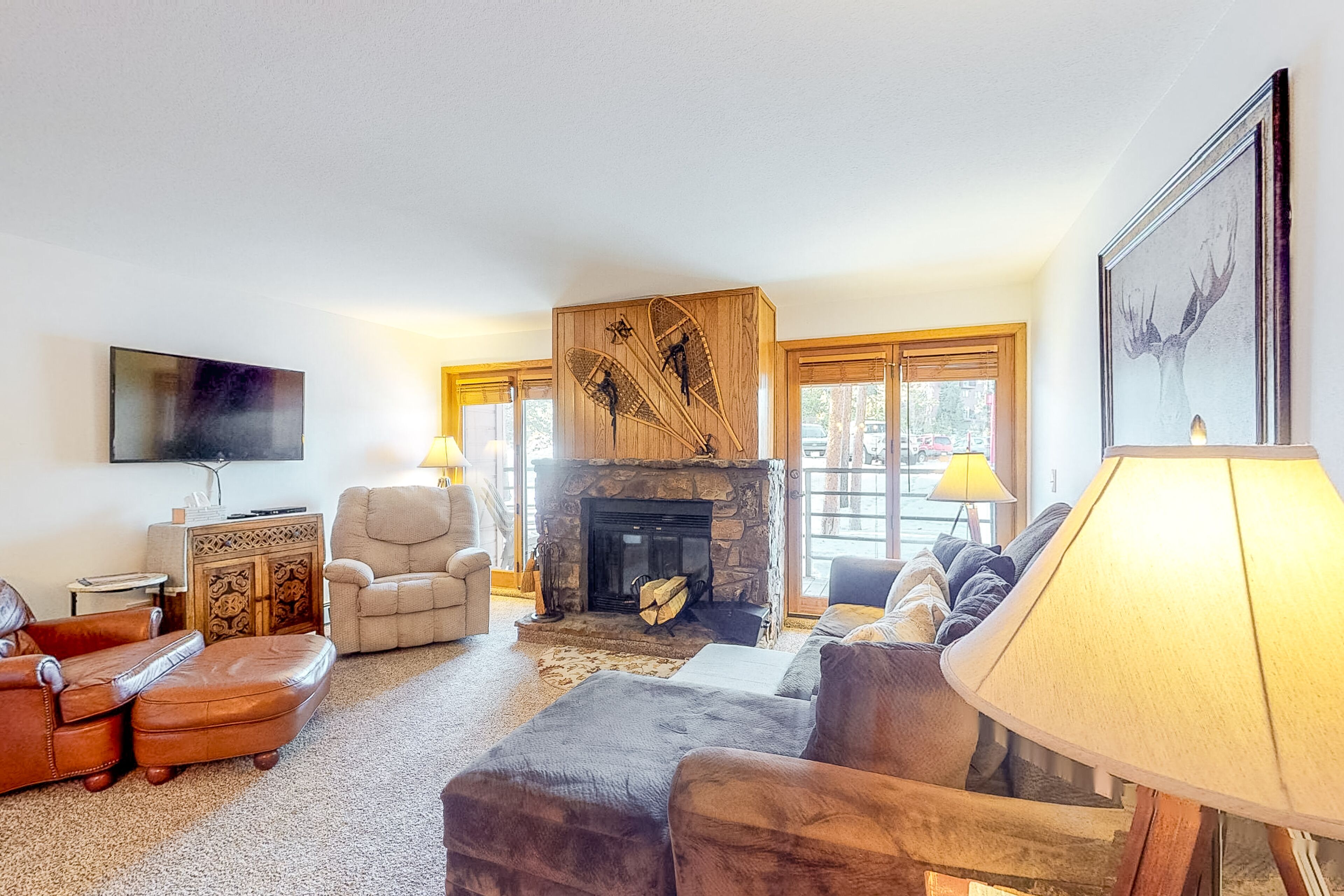 Comfortable mountain condo with wood-burning fireplace & patio, near skiing