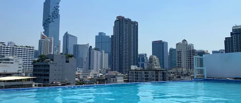 Outdoor pool, open 7:00 AM to 8:30 AM, free pool cabanas, pool umbrellas
