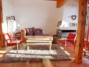 Flat-screen TV, fireplace