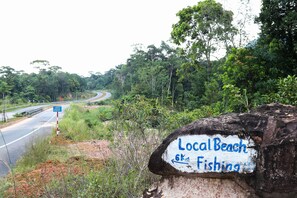 A road sign indicating a local beach and fishing area 6km away. - Local Beach Phu Quoc (Phu Quoc)