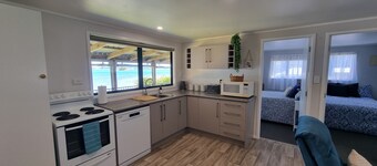 BEACHFRONT COTTAGE - URQUHARTS BAY
A classic Kiwi bach just steps from the sea