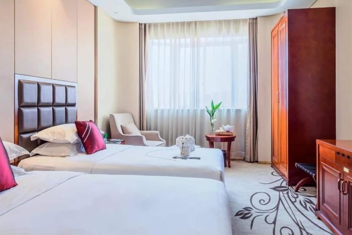 Habitación Deluxe con 2 camas individuales | Escritorio, cortinas opacas, wifi gratis