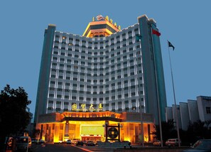 Front of property – evening/night - Hengdian World Studios · Guomao Hotel (Qingming Riverside Scene Store) (Jinhua)