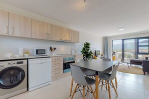 Comfort Apartment | Private kitchen | Full-size fridge, microwave, oven, dishwasher - Tokai Royale (Cape Town)