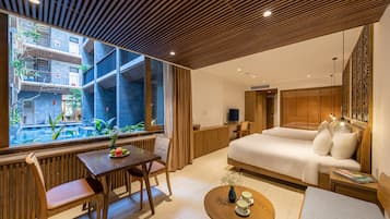 Family Studio Suite with Pool View | Premium bedding, in-room safe, individually decorated, desk