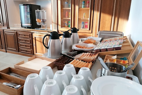 Daily buffet breakfast (EUR 9.00 per person)