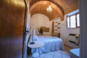 Appartement, 1 slaapkamer (In Famiglia) | Pillowtop-bedden, verduisterende gordijnen, gratis wifi, beddengoed