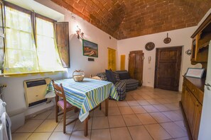Apartment, 1 Bedroom (In Famiglia) | Living area | Flat-screen TV - Il Sogno di Annalisa (Volterra)