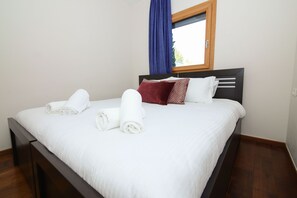 Appartement luxueux | 4 chambres, coffre-fort, fer et planche à repasser