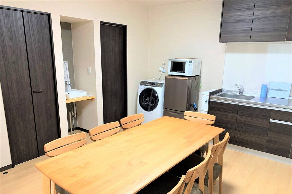 Huis (Building F) | Woonruimte | Flatscreentelevisie
