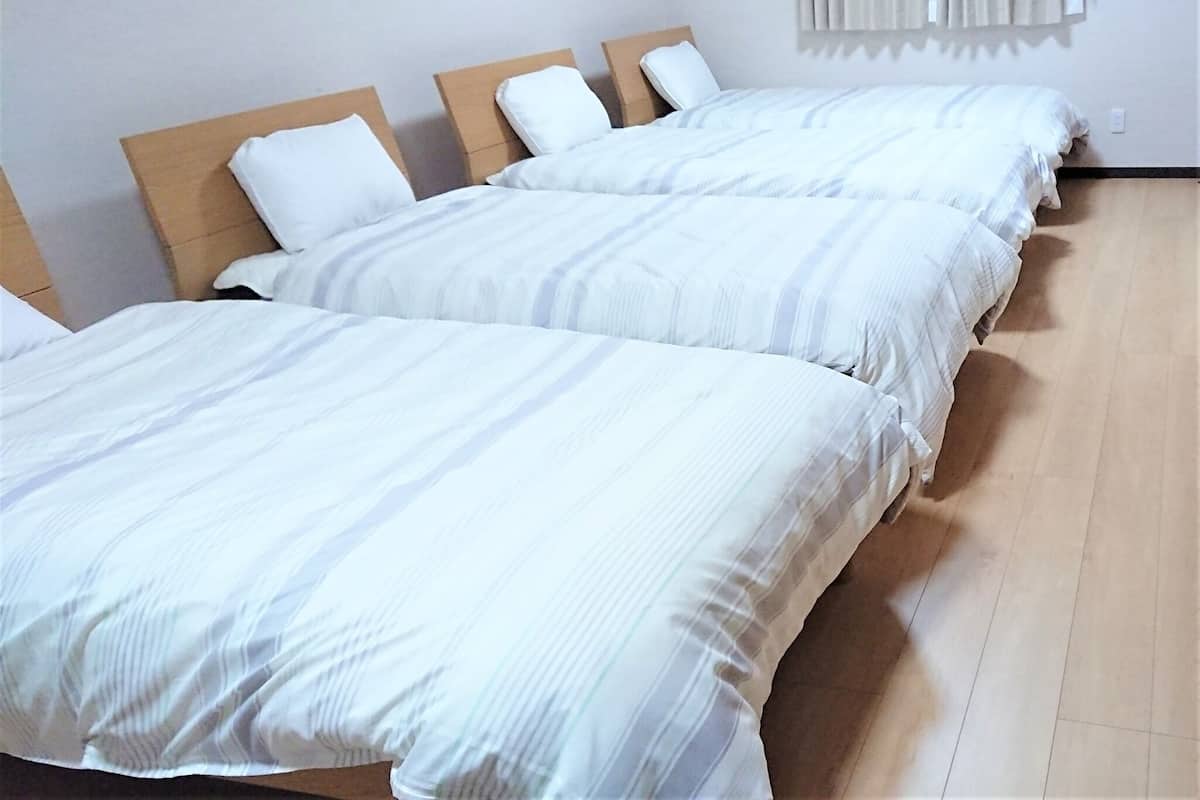 Blackout drapes, WiFi (free), bed sheets