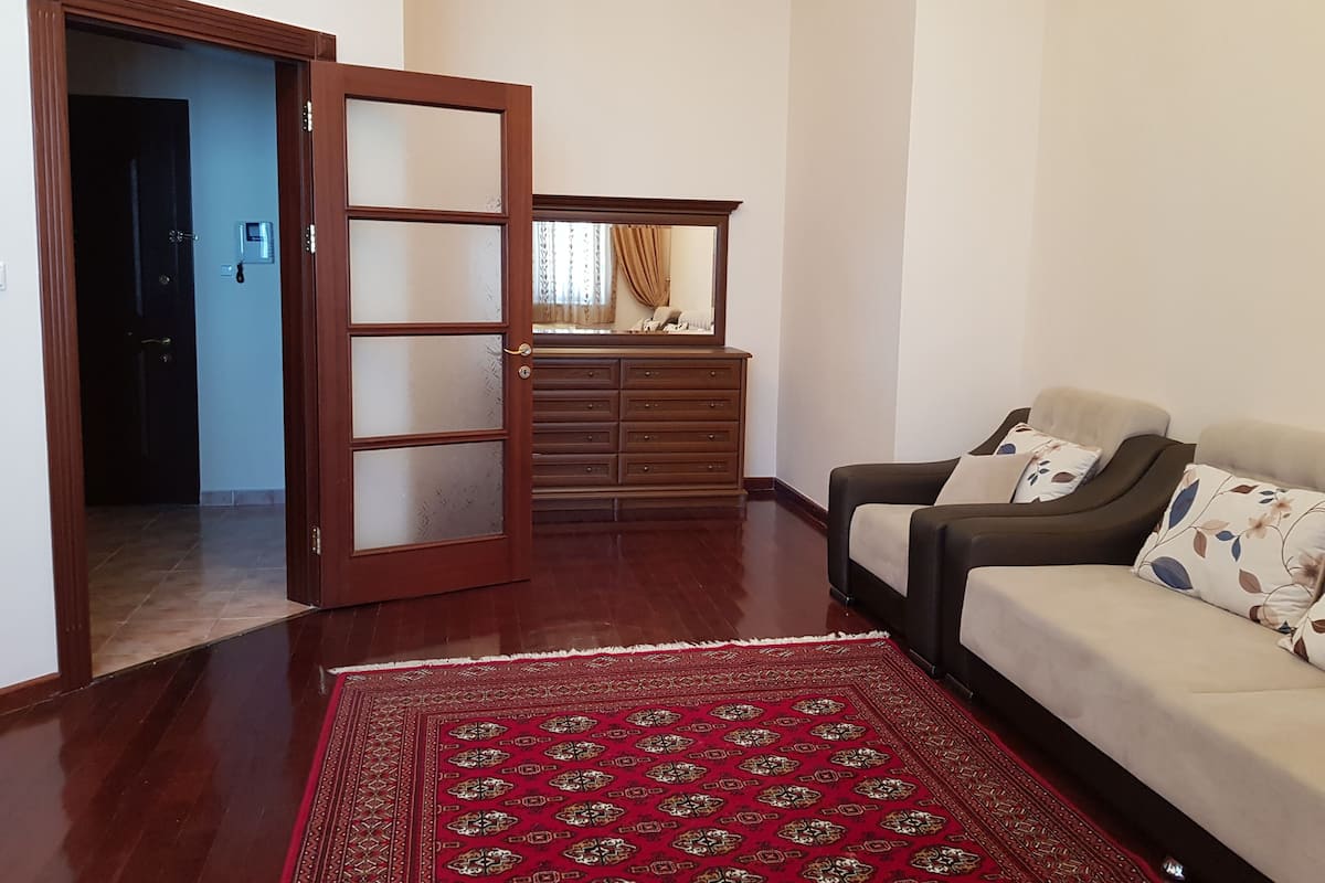 Comfort Apartment | Living room | 43-inch LED TV with satellite channels, TV