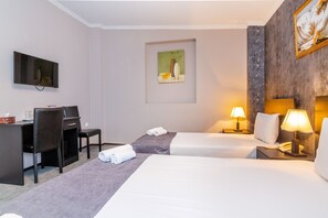 Quarto família, sacada | Roupas de cama premium, frigobar, cofres nos quartos