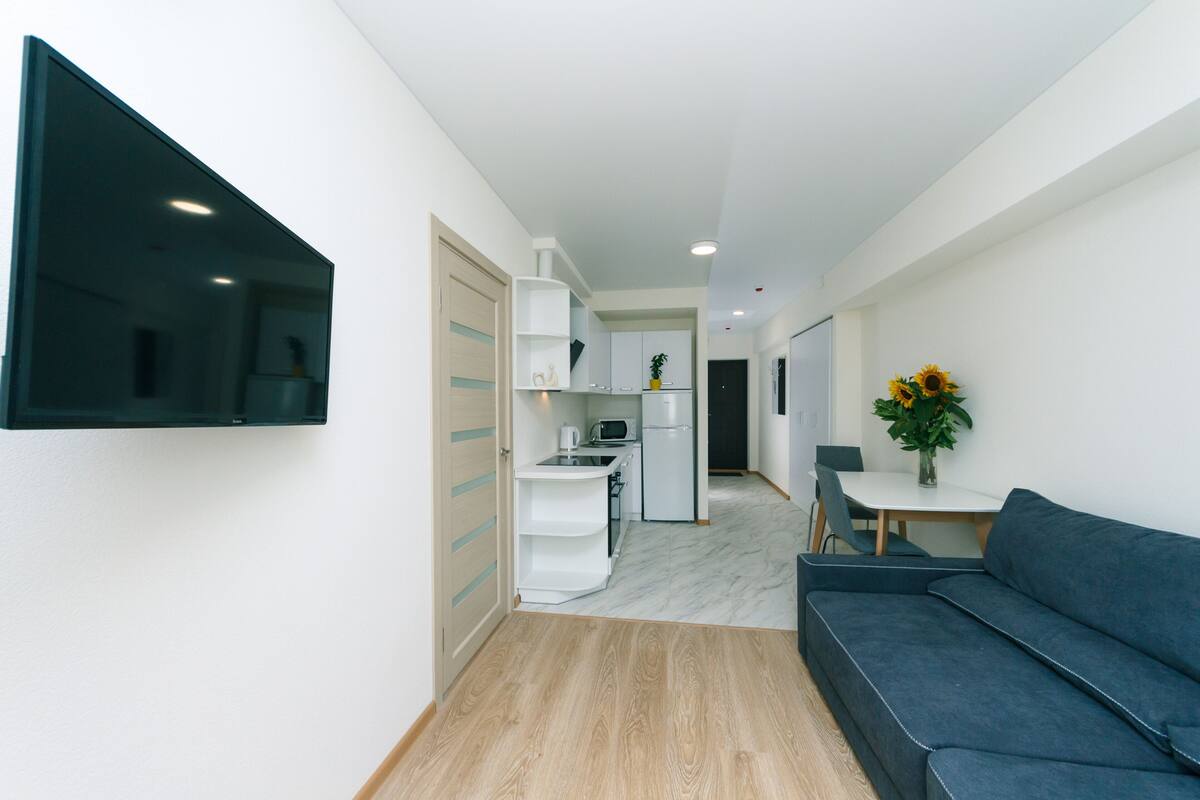 Deluxe Apartment | Living area | Smart TV