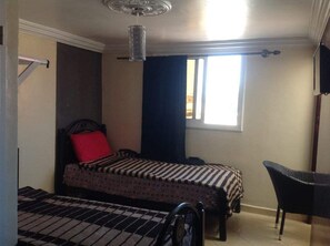 Economy Twin Room, Balcony | Laptop workspace, blackout curtains, free cots/infant beds, free WiFi