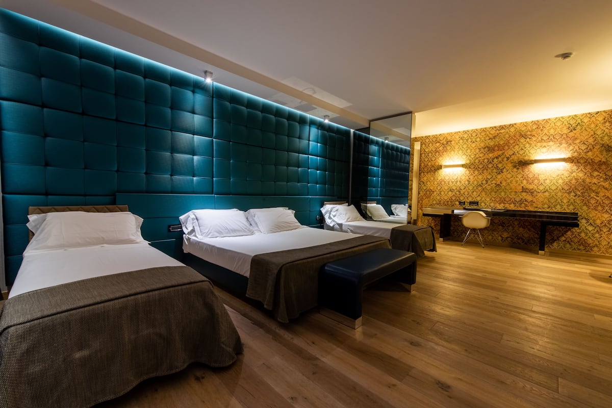 Quarto família (Family only) | 1 quarto, roupas de cama premium