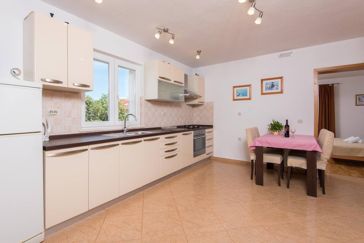 Apartment, Sea View | Living area | Flat-screen TV