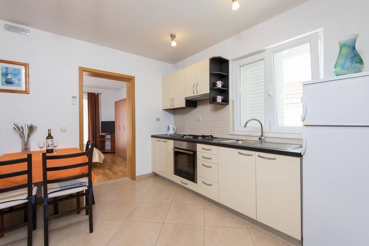 Apartment, Balcony | Private kitchen | Fridge, oven, stovetop, electric kettle