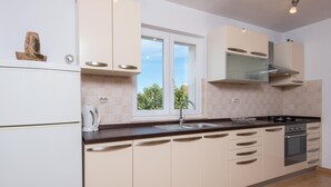 Apartemen, pemandangan laut | Dapur pribadi
