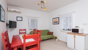 Apartamento, 3 habitaciones | Zona de estar