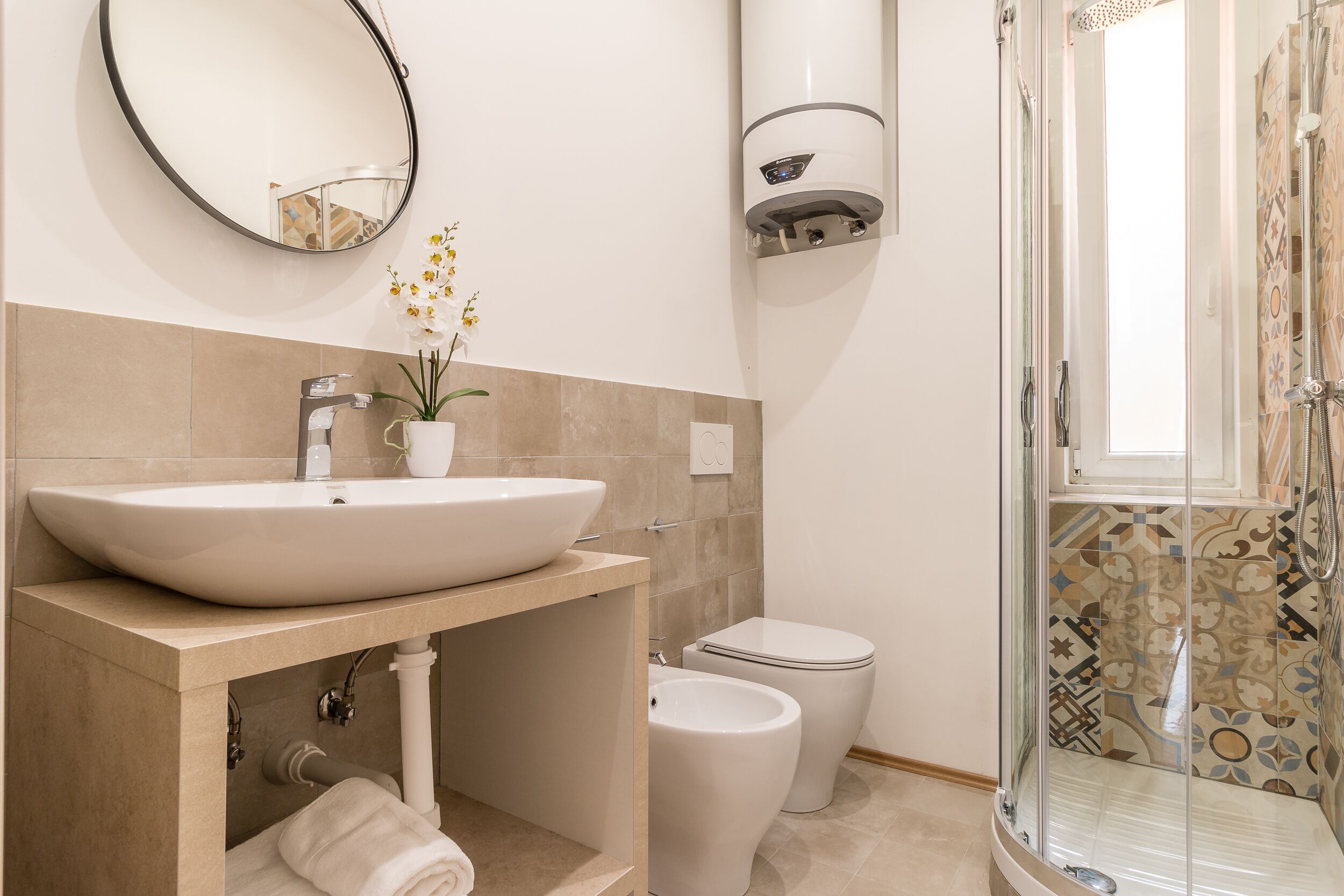 Shower, hair dryer, towels, shampoo